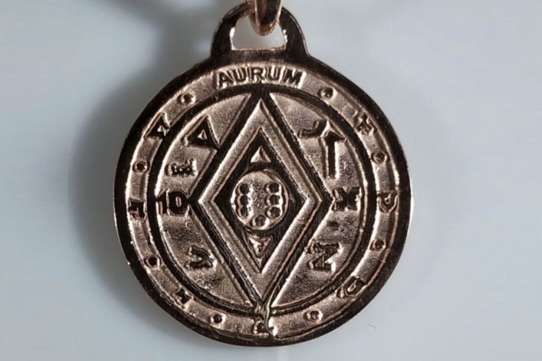 Amuleta runica pentru a atrage bani