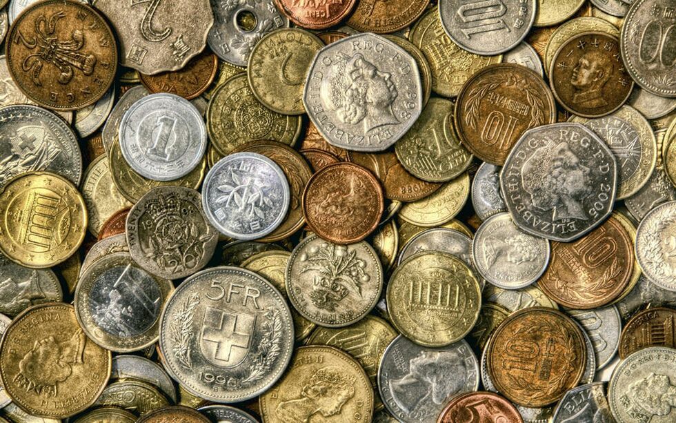 Monedele norocoase sunt un simbol al bunăstării financiare